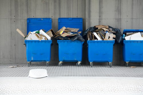 Skip hire vehicle and eco-friendly skip bins in Bayswater street setting