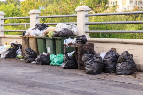 Workers sorting materials at a Bayswater recycling collection point