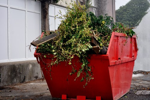 Loading a skip for commercial waste management in Bayswater